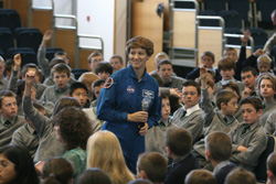 Eileen Collins with group of primary school children 