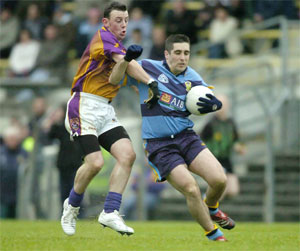 John Hanley, UCD, in action against Stephen Sheppard, Wolfe Tones. AIB Leinster Senior Club Football Championship, Quarter-Final, Wolfe Tones v UCD, Pairc Tailteann, Navan, Co. Meath. Picture Credit: Brian Lawless / SPORTSFILE