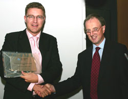 Prof Barry Smyth, Head of the UCD School of Computer Science and Informatics receiving the “Enterprise Ireland Informatics Commercialisation Award 2006” from Fergal O’Morain, Director of Applied Research Commercialisation at Enterprise Ireland