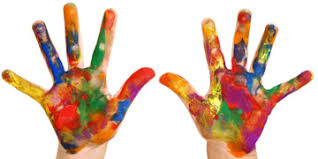 Childs hands covered in paint