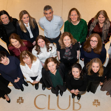 Group of people standing together looking up