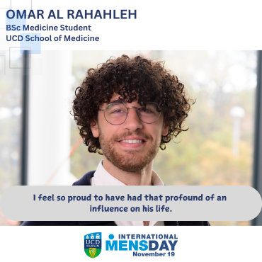 Man smiling to camera for International Men's Day