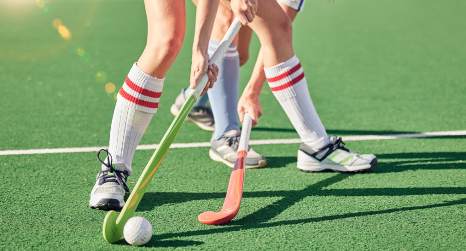 Girls playing hockey