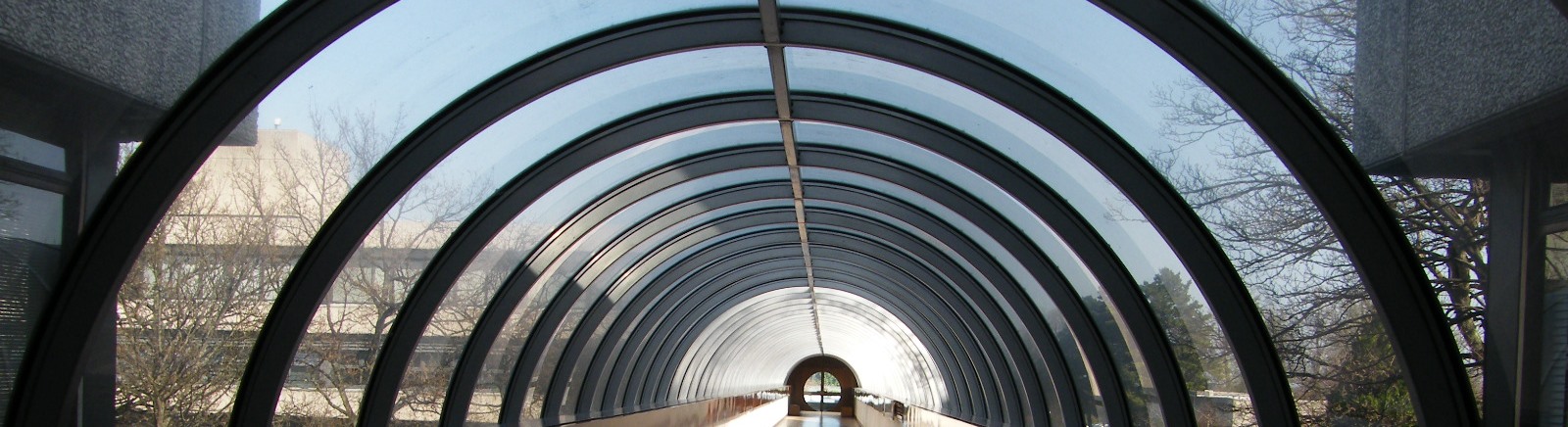 Image of sky tunnel between two building, circular shape