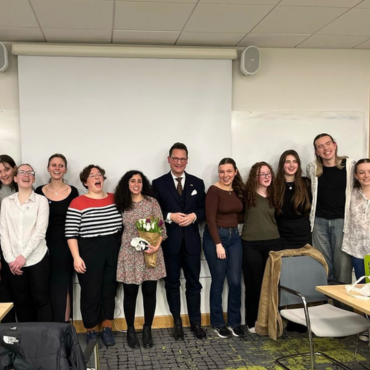 Group photo of the debating team and organisers