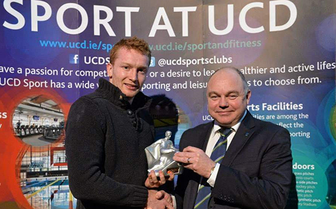 Caolan Cullen with UCD President Prof Andrew Deeks