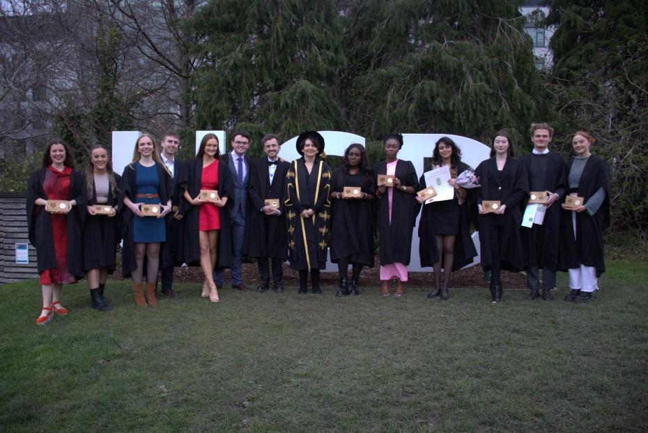 Group of students posing with their awards.