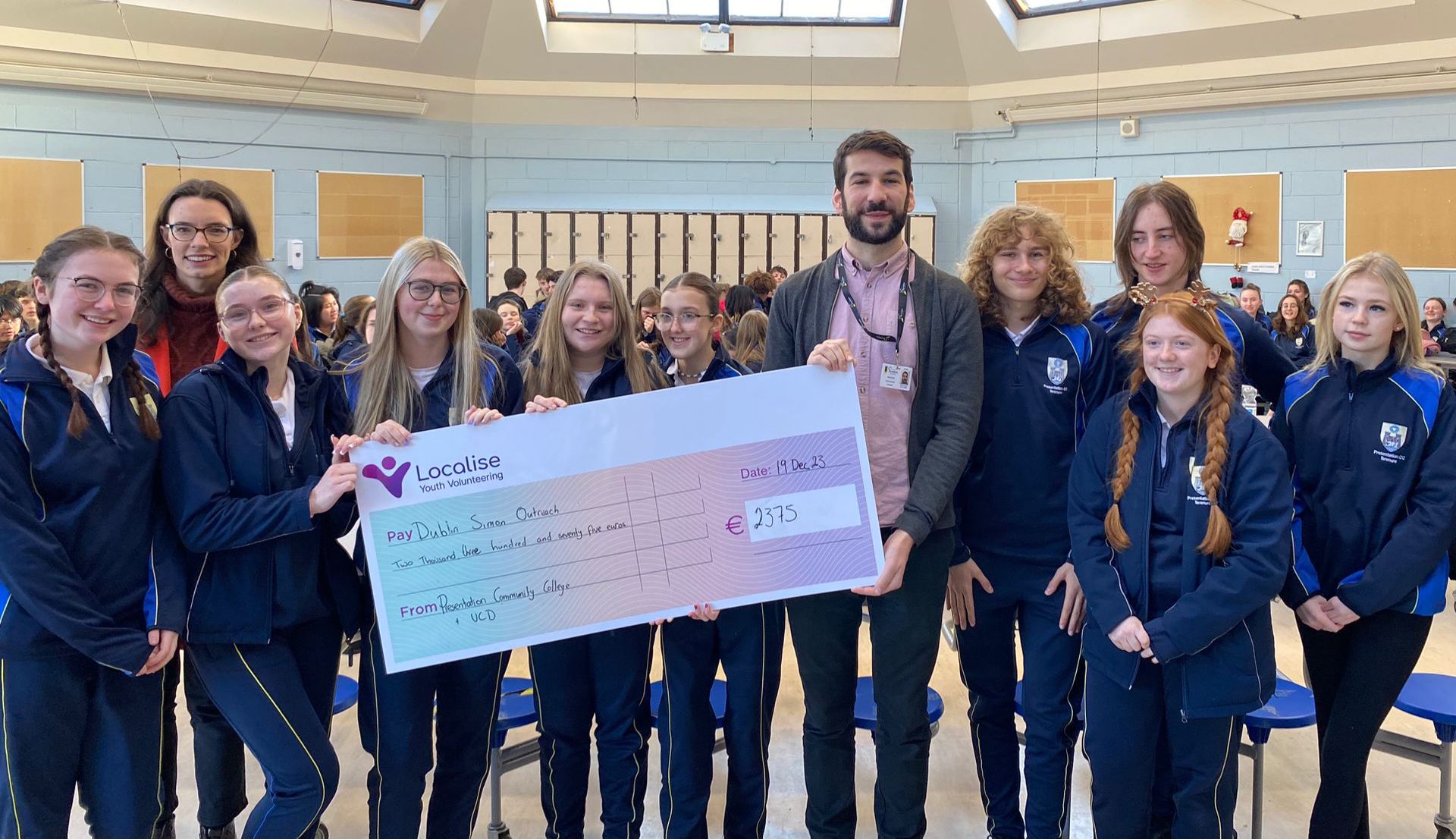 Students from Terenure Presentation College hand over vouchers for the rough sleepers of Dublin City, pictured with Theresa O'Leary from UCD in the Community.