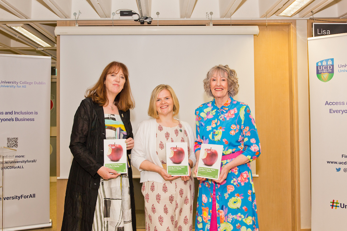 3 ladies each holding a book with an apple on the cover