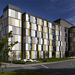 The student accommodation at Roebuck Hall reflects UCD's continued commitment towards sustainability principles and was designed to help reduce the student carbon footprint during their residence on the Belfield Campus by incorporating the use of rain water harvesting, solar panels for water heating, and a highly insulated facade to help retain the heat in line with passive energy practice.