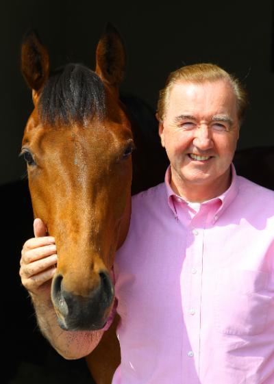 Dermot Weld with a horse