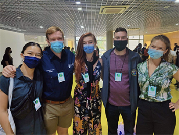 Trinity Dockery and James Caligiuri with delegates at the IVSA Global congress in São Paulo, Brazil.