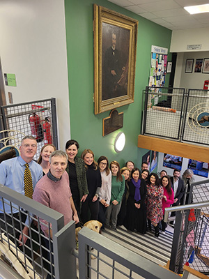 Minding Your Wellbeing facilitators photographed on the stairs in the Veterinary Sciences Centre